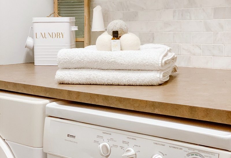 Laundry room with clean dryer.