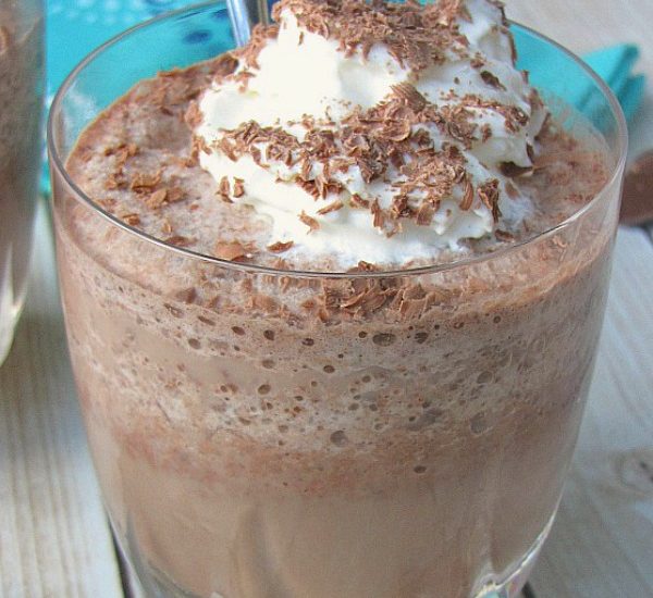 Frozen hot chocolate topped with whipped cream and chocolate shavings.