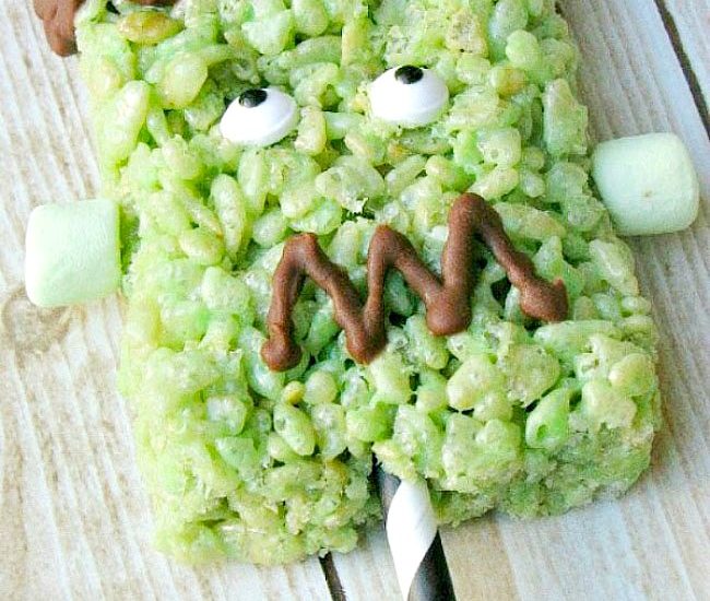 Cute Frankenstein Rice Krispie treat with paper straw handle.