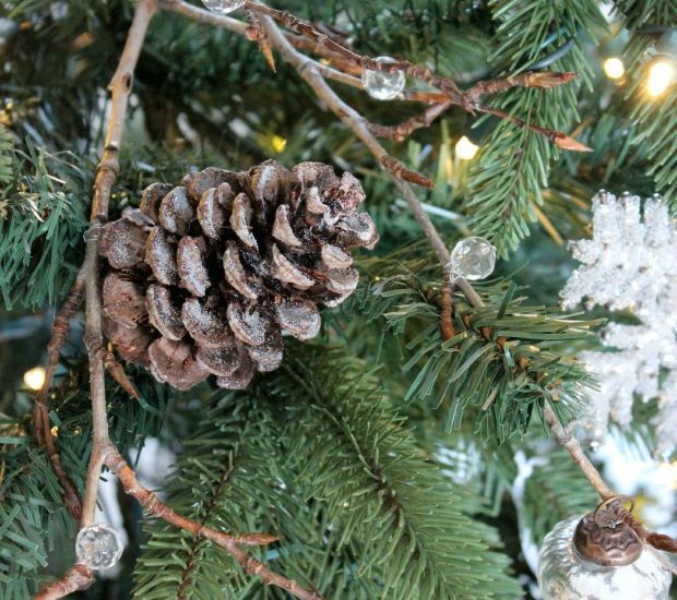 Icy twig spray. Such a pretty way to fill in all of those bare spots on your tree and they look beautiful with the lights reflecting off of them!