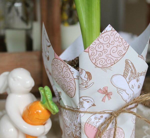 Cute Easter planter with free printable wrapping paper. This would make a great hostess gift or looks beautiful for some Easter decor.