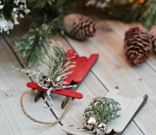 Popsicle stick sleds. These easy handmade Christmas ornaments can be dressed up or done as a simple kids Christmas craft.