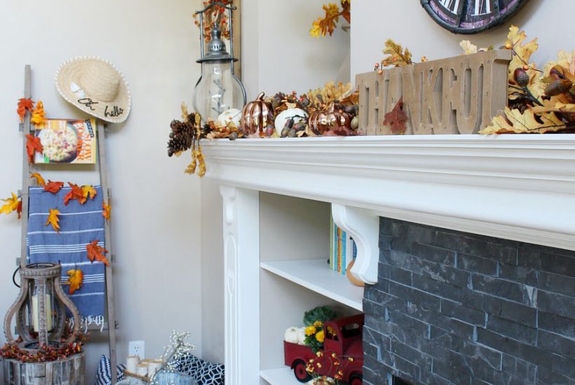 Family Room Fall Decorating Ideas. Easy fall decorations in traditional autumn colors with pops of blue.