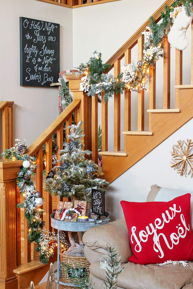 https://www.cleanandscentsible.com/wp-content/uploads/2018/12/Christmas-Garland-on-Stairs-copy.jpg