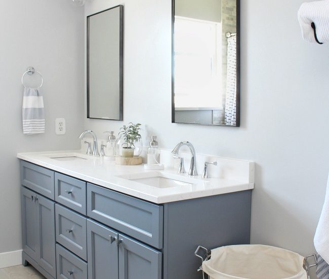 Coastal style bathroom with double vanity.