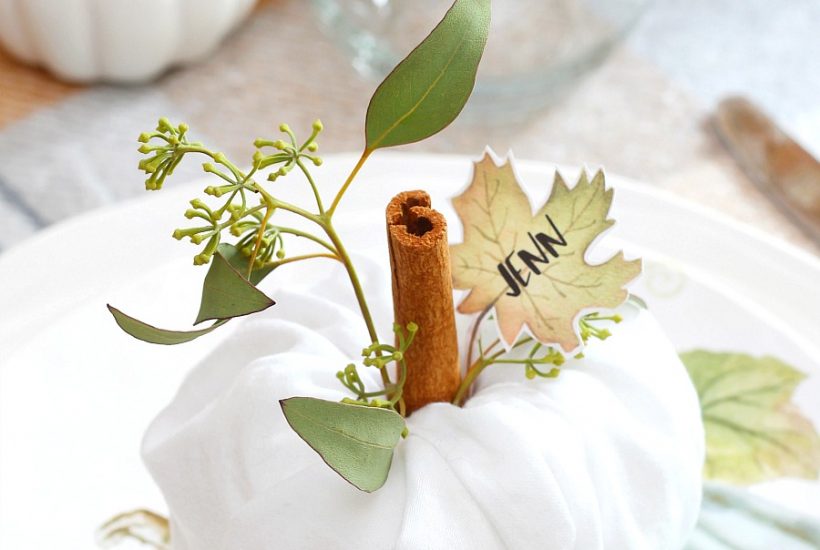 Cute napkin fold pumpkins for Thanksgiving place settings.