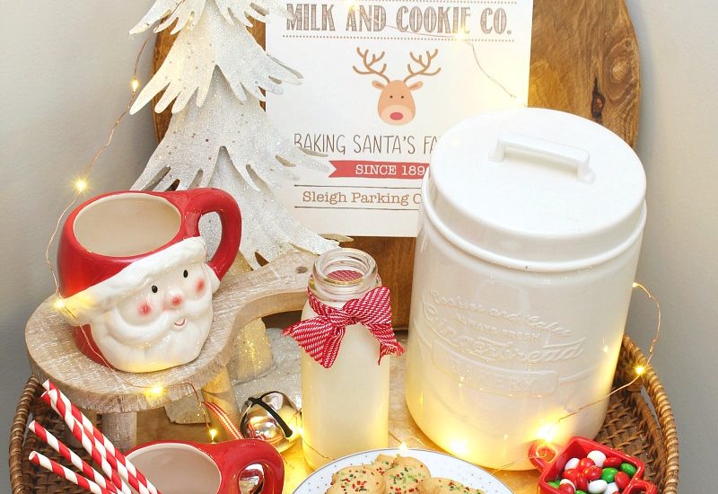 Christmas milk and cookie bar wth Santa mugs and cute Rudolph's Milk and Cookie Co. free Christmas printable.