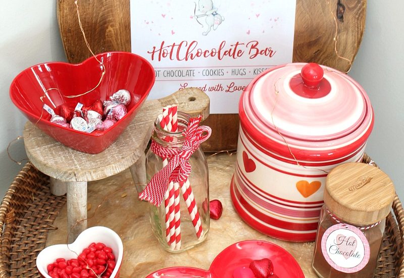 Adorable hot chocolate bar idea with free Cupid's Cafe printable.