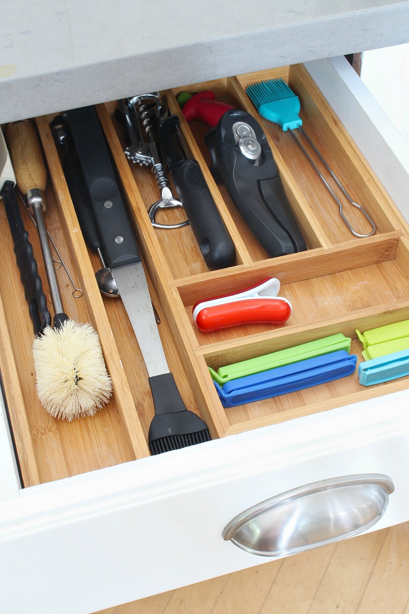 https://www.cleanandscentsible.com/wp-content/uploads/2020/07/kitchen-cabinet-organization-drawer-dividers-Clean-and-Scentsible.jpg