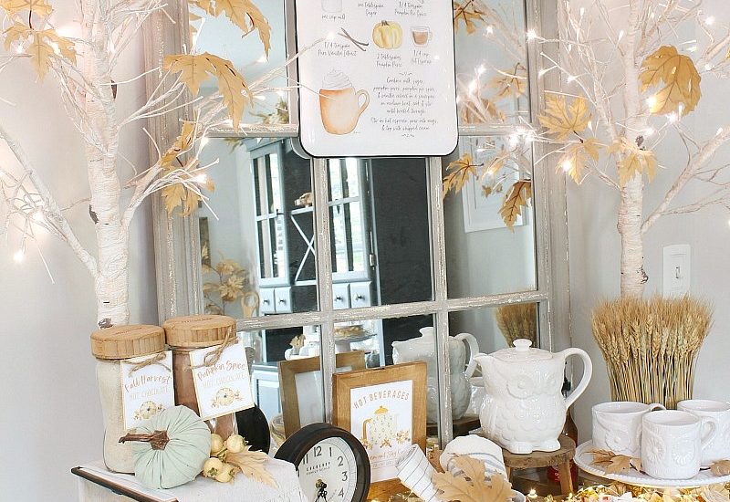 Pretty fall hot beverage bar decorated in muted fall colors.