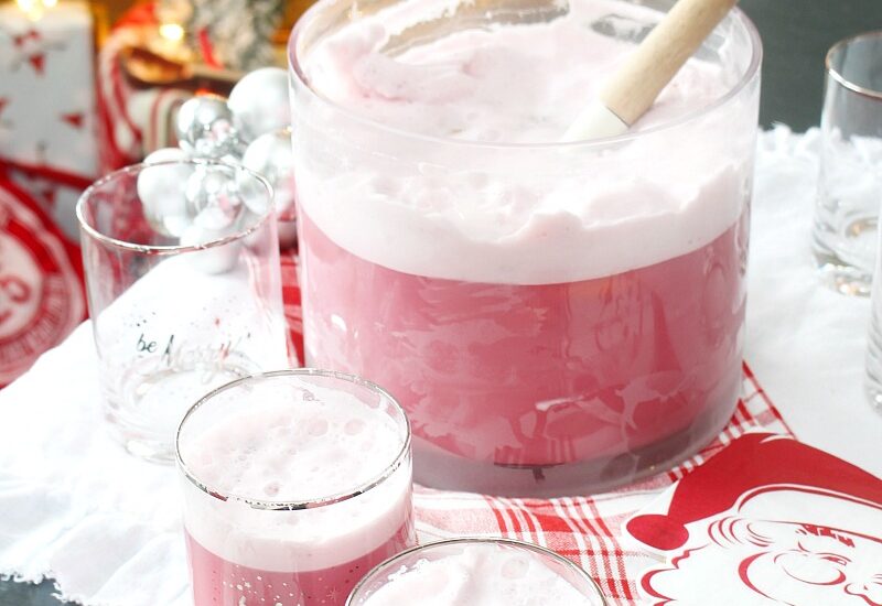 Christmas sherbet punch with Santa napkins and plaid towel.