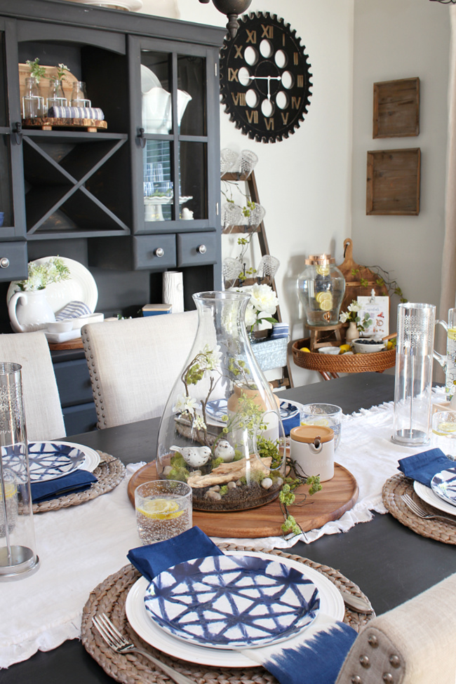 Pretty summer dining room decorated with blues, greens, and a hint of yellow.