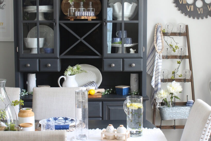 Dining room decorated for summer with pops of blue, green and yellow.