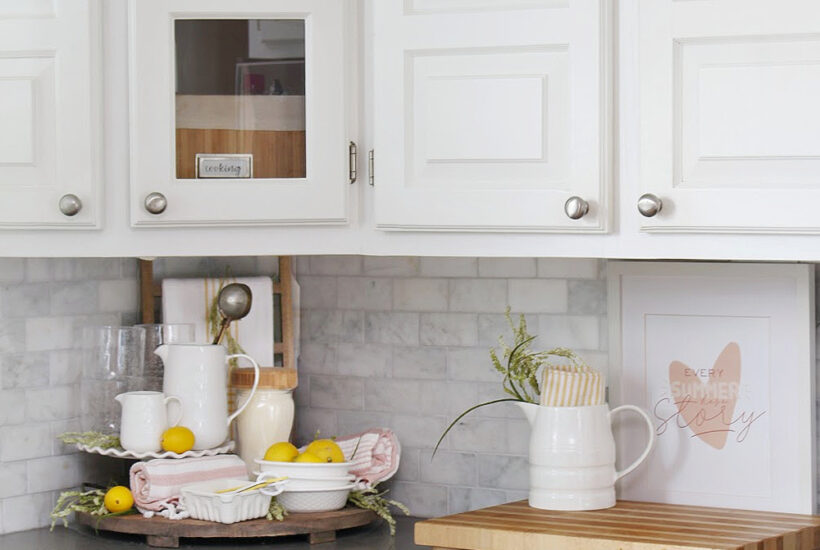 White kitchen decorated for summer with pastels for a fresh look.