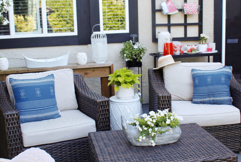 Backyard patio with club house chairs.