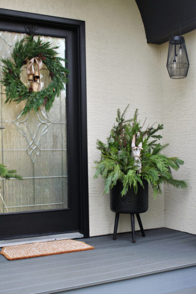 DIY Outdoor Christmas Planters with Fresh Greenery - Clean and Scentsible