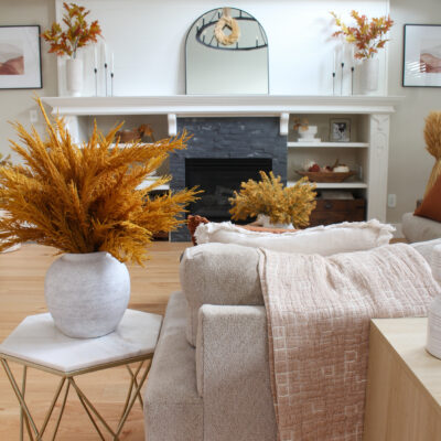 Fall living room decorated with deep orange and browns.