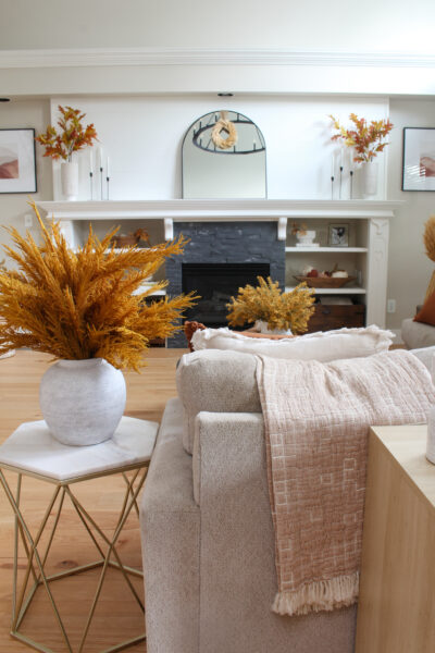 Fall living room decorated with deep orange and browns.