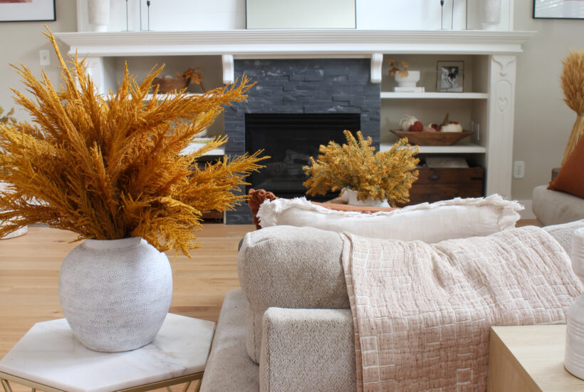 Fall living room decorated with deep orange and browns.