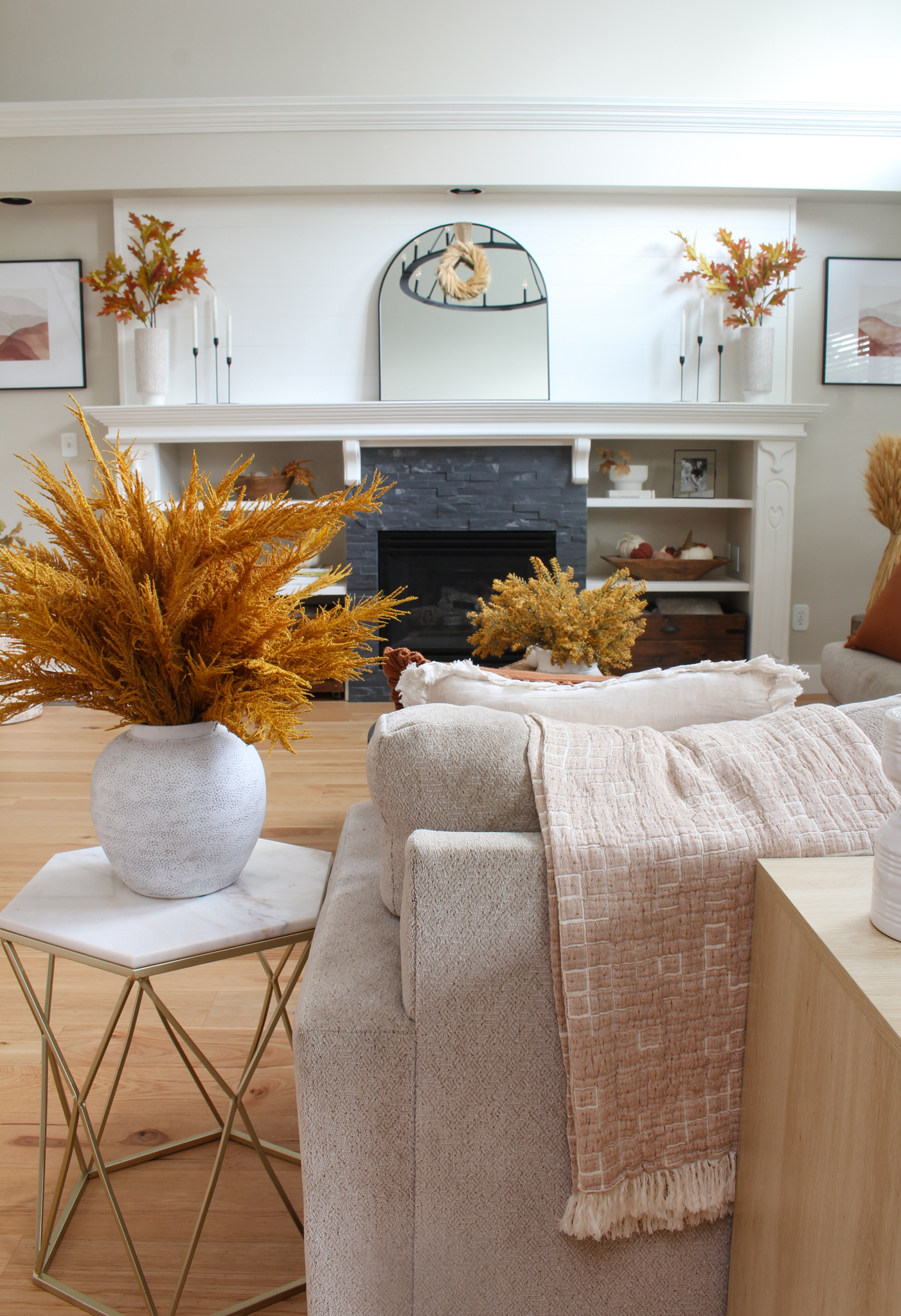 Fall living room decorated with deep orange and browns.