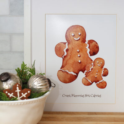 Gingerbread printable with two gingerbread men and saying "Count memories not calories".