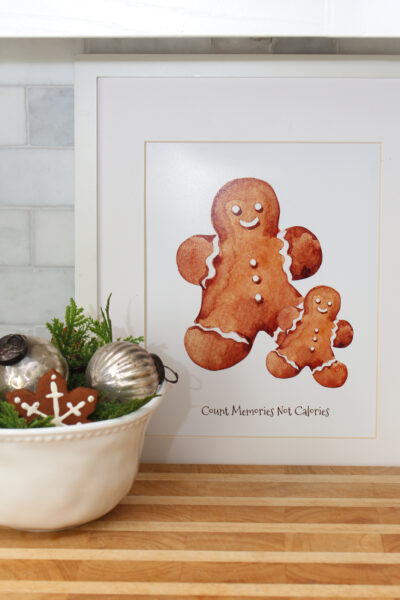 Gingerbread printable with two gingerbread men and saying "Count memories not calories".