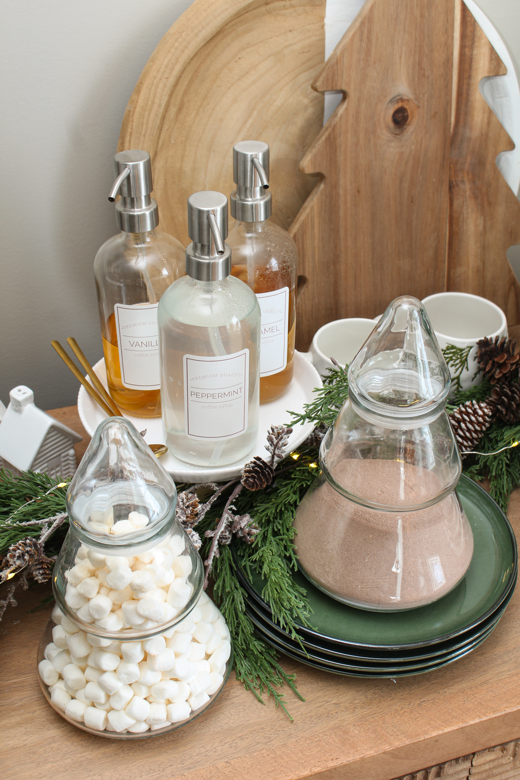 Christmas hot chocolate bar using glass tree jars for the hot chocolate and marshmallows.